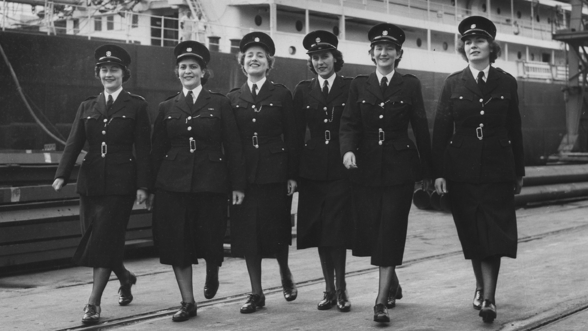 PLA police women on a quayside