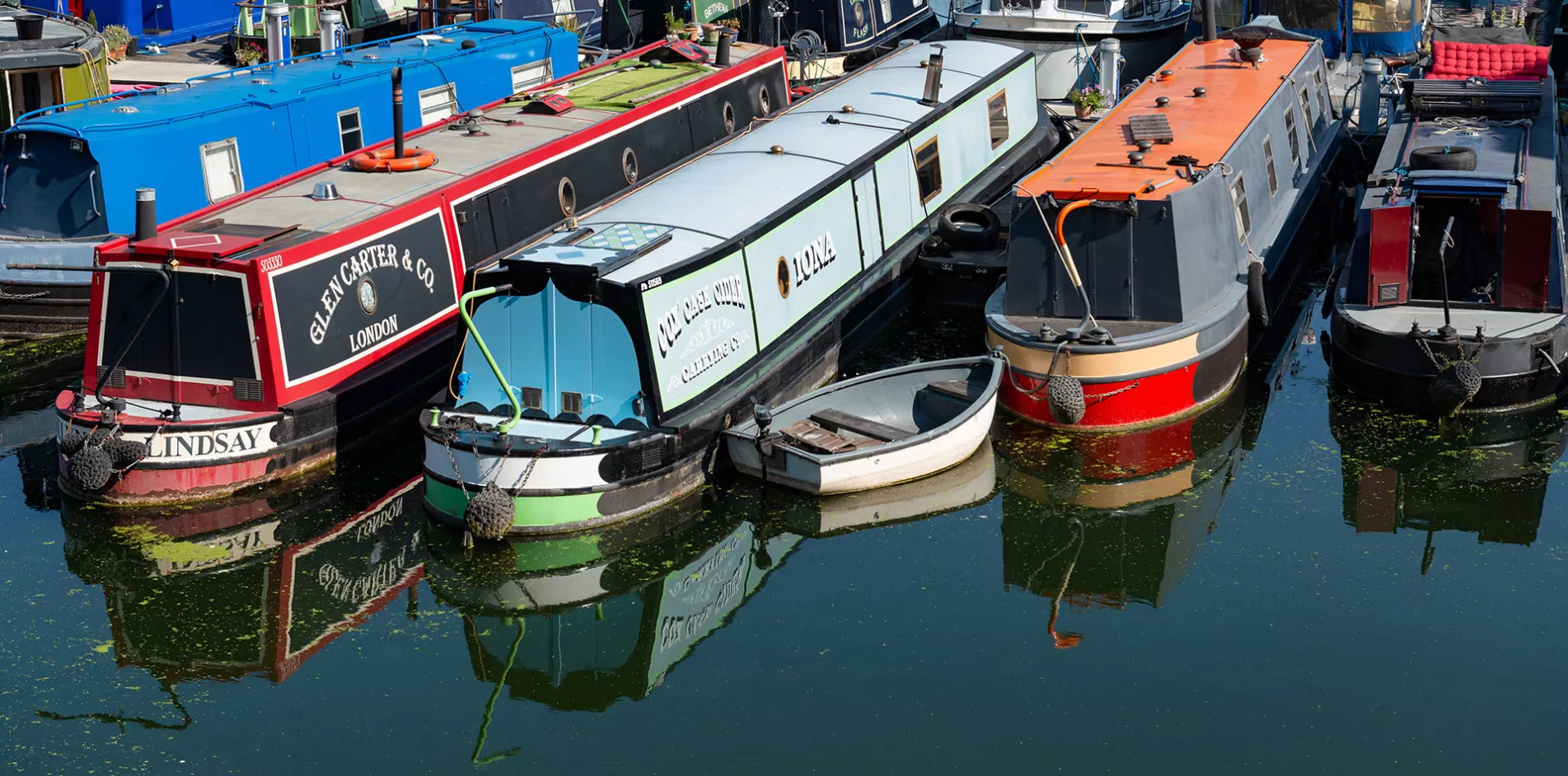 Narrow boats water reflections