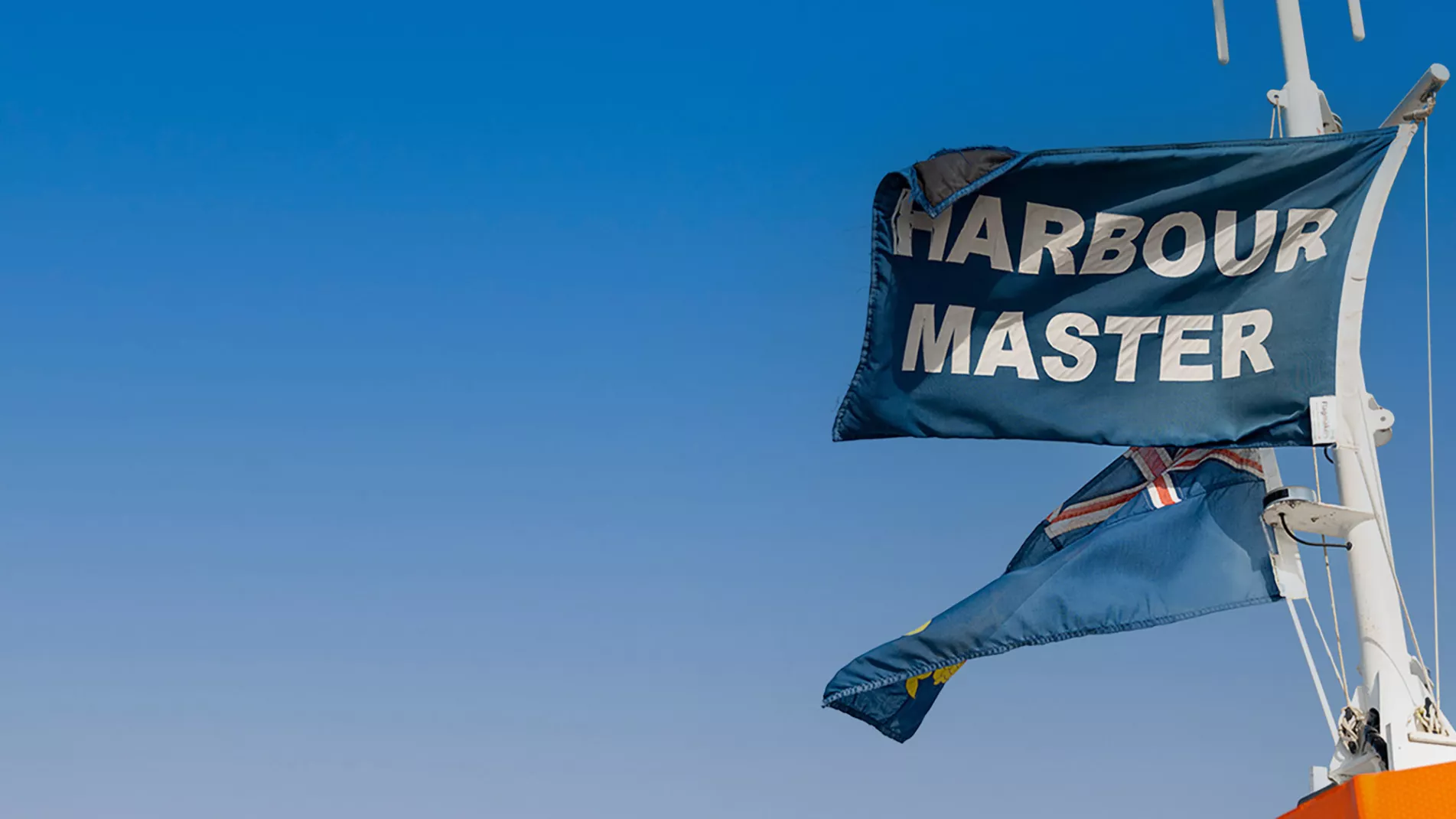 Flag which reads Harbour Master
