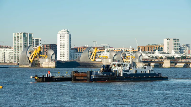 Barrier Gardens Pier at Woolwich with Thames Barrier in the background