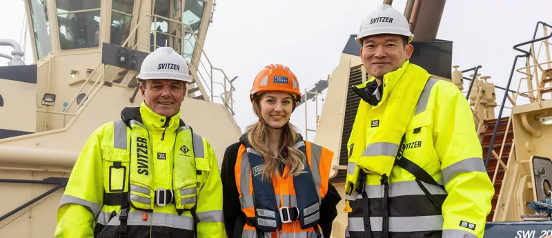 Svitzer’s Dave Watson (left) and Cliff Chow (right) with Grace Staines from PLA’s Environment team.